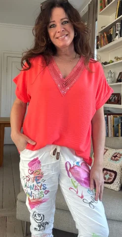 Dicota bluse med v-hals og pailletter orange LikeLondon