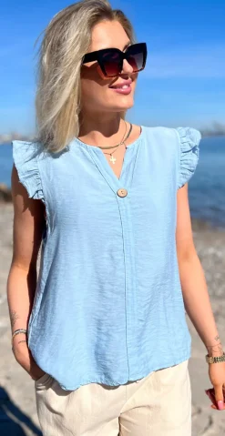 Lotus bluse med flæse detaljer lysblå LikeLondon